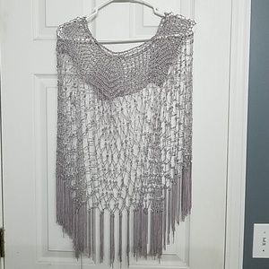 Beautiful crocheted poncho cover!